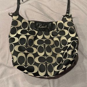 Coach purse- small and convenient for out on a date, or dancing- crossbody fit.